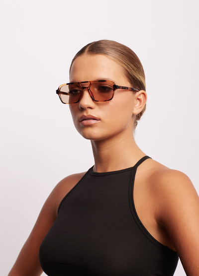 Model wearing the tomorrowland sunglasses is honey turtle