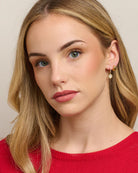 Gold round earrings with cubic zirconiaGold round earrings with cubic zirconia