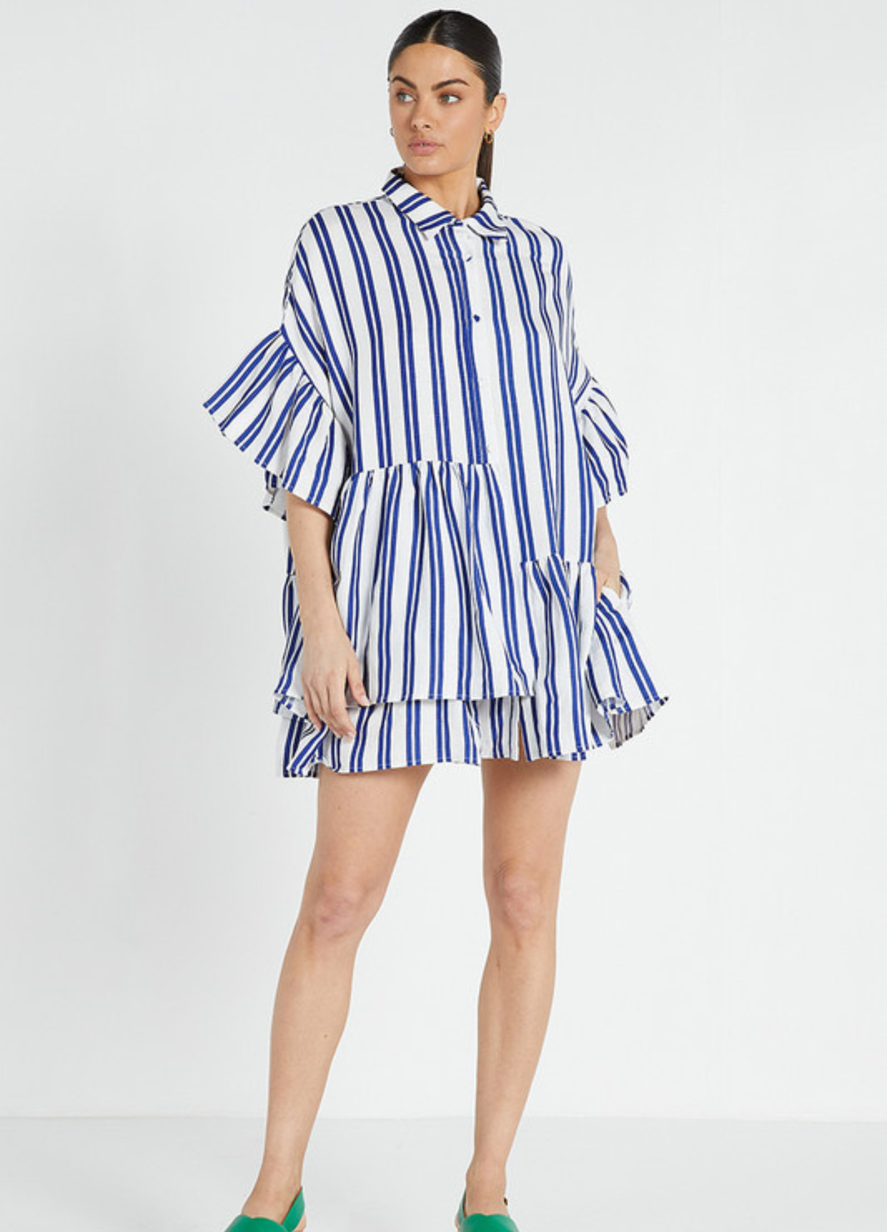 The famous bohemian traders genoa mini dress with ruffle details and mid sleeve in linen blue and white stripe