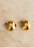 Round gold earrings from Indigo & Wolfe