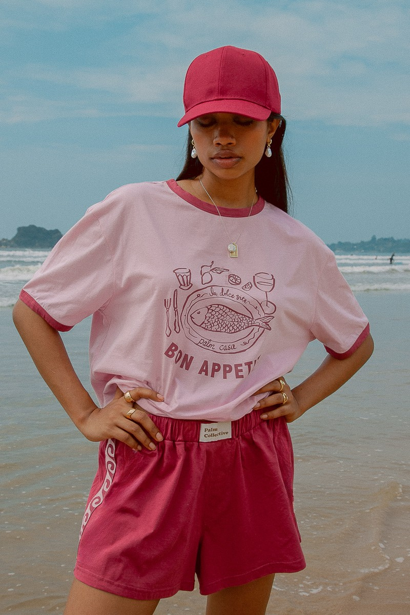 Pink shorts with contrast tape on sides