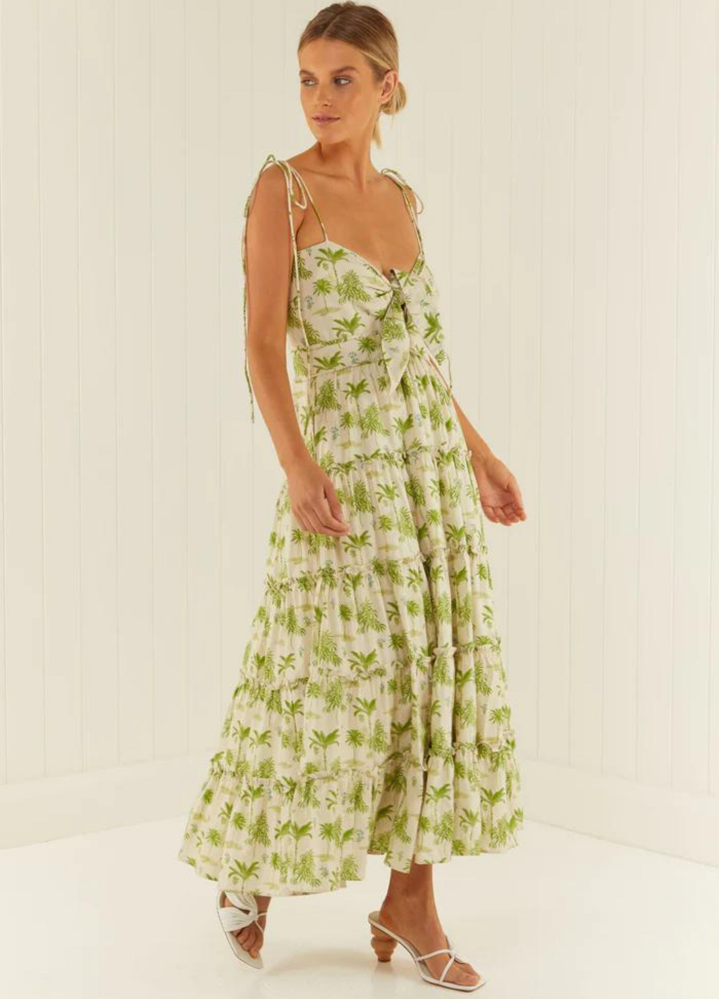 Model wearing the palm noosa james dress in green palm print