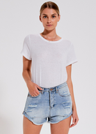 Distressed mid wash short with button closure 