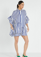 The famous bohemian traders genoa mini dress with ruffle details and mid sleeve in linen blue and white stripe