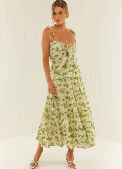 Model wearing the palm noosa james dress in green palm print