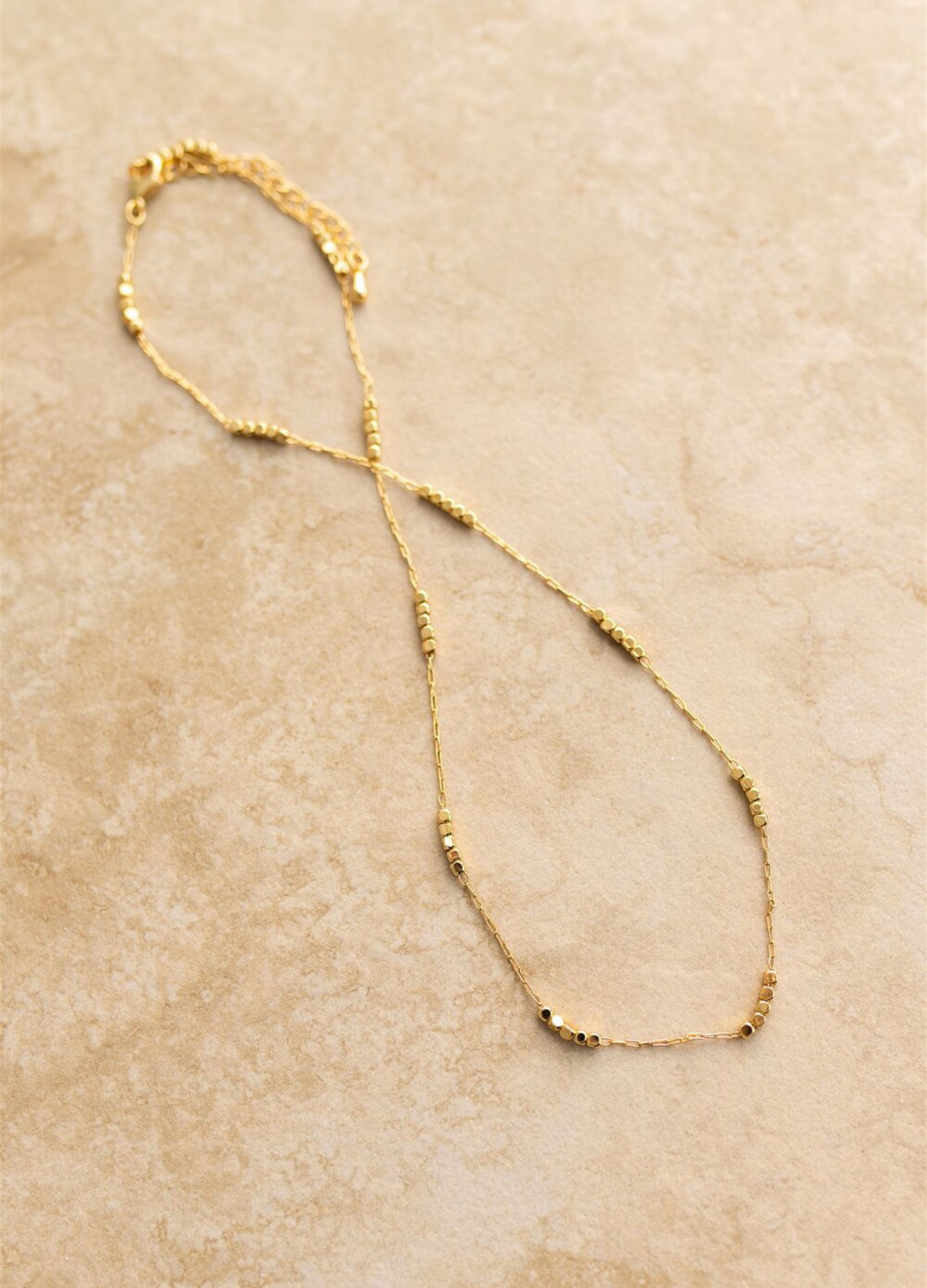 Crushed gold chain necklace from Indigo + Wolfe 