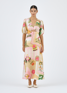 Roame Kozomo Midi Dress in Pink City Print with cut out under bust and short sleeves