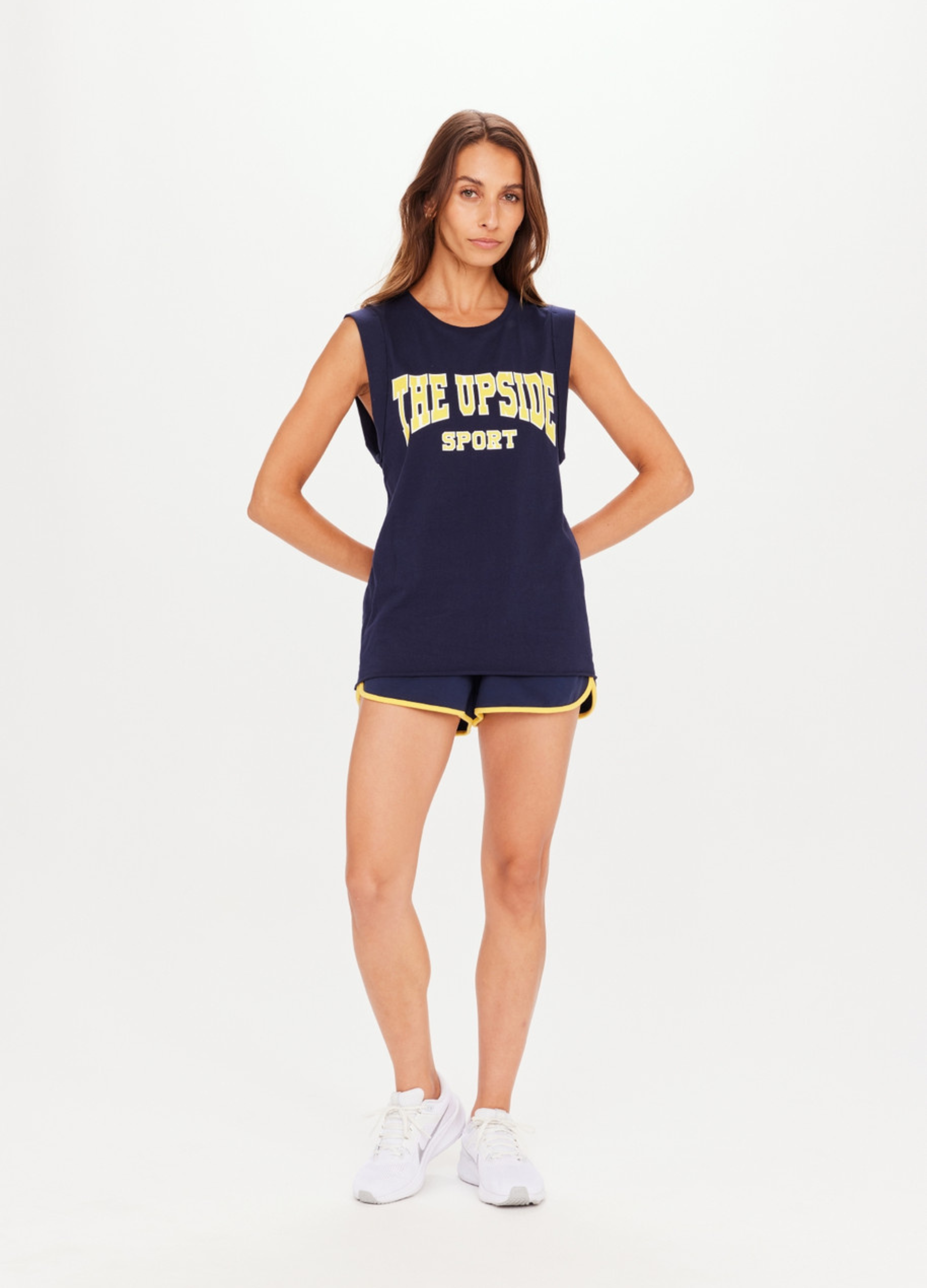The Upside Ivy Leage Tank in navy with yellow and white logo design
