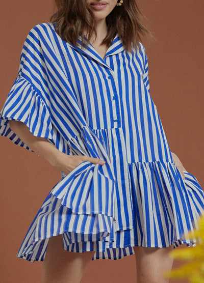 Model wearing blue and white shirt dress from Bohemian Traders