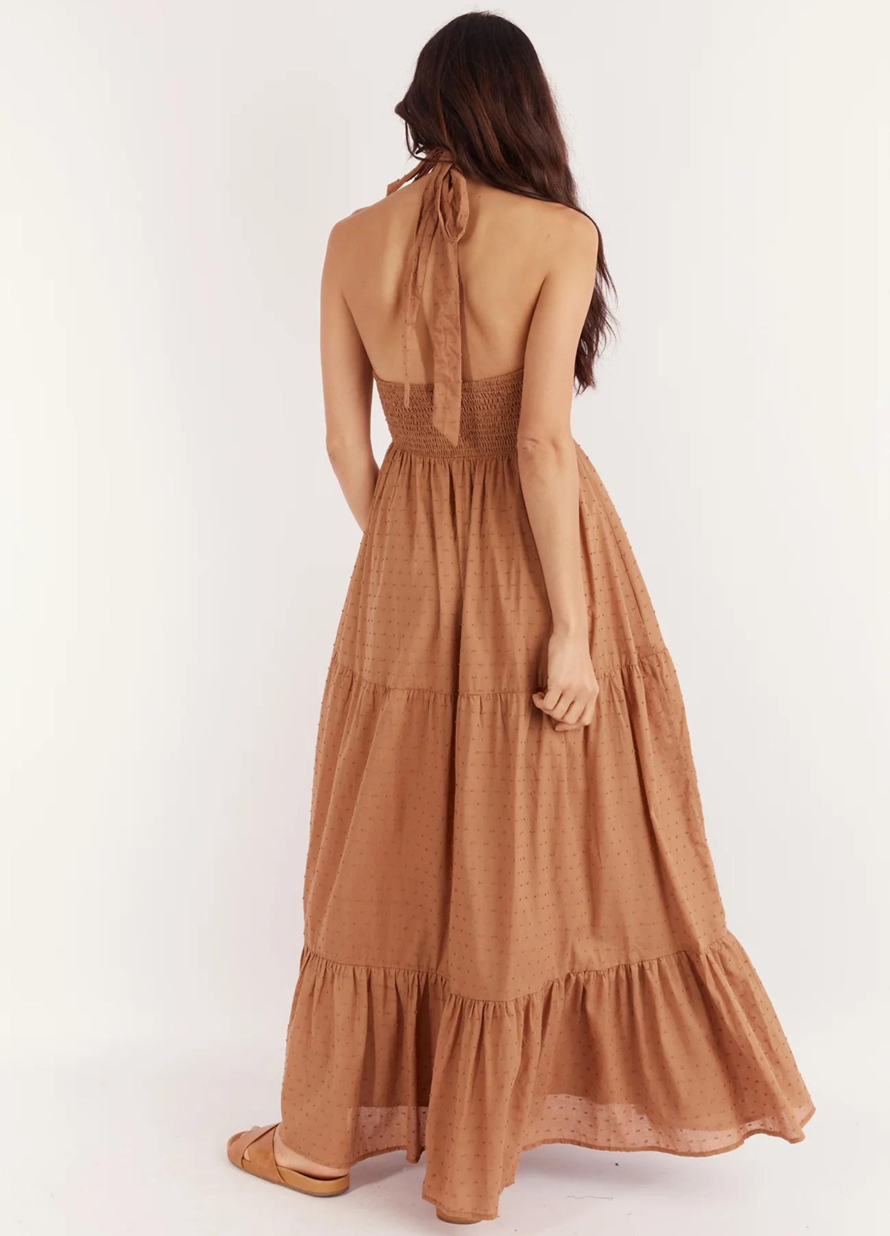 Halterneck maxi dress in brown spot print fabric with a back neck tie