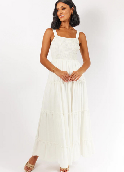 Model wearing the white Ashlyn Dress from Girl and the Sun 