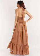 Halterneck maxi dress in brown spot print fabric with a back neck tie