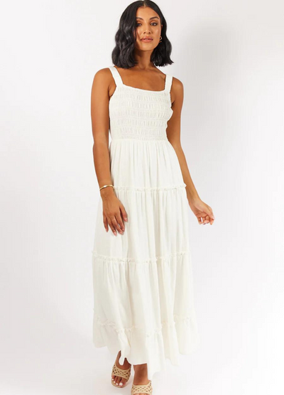 Model wearing the white Ashlyn Dress from Girl and the Sun