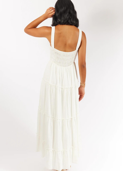 Model wearing the white Ashlyn Dress from Girl and the Sun