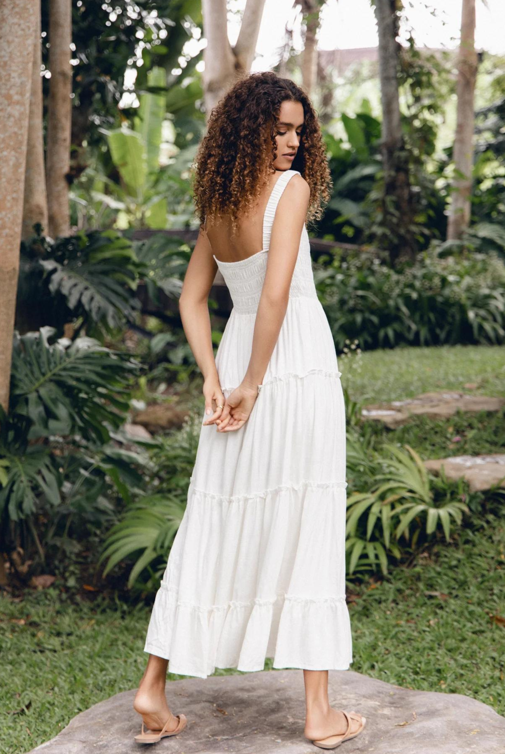 Model wearing the white Ashlyn Dress from Girl and the Sun