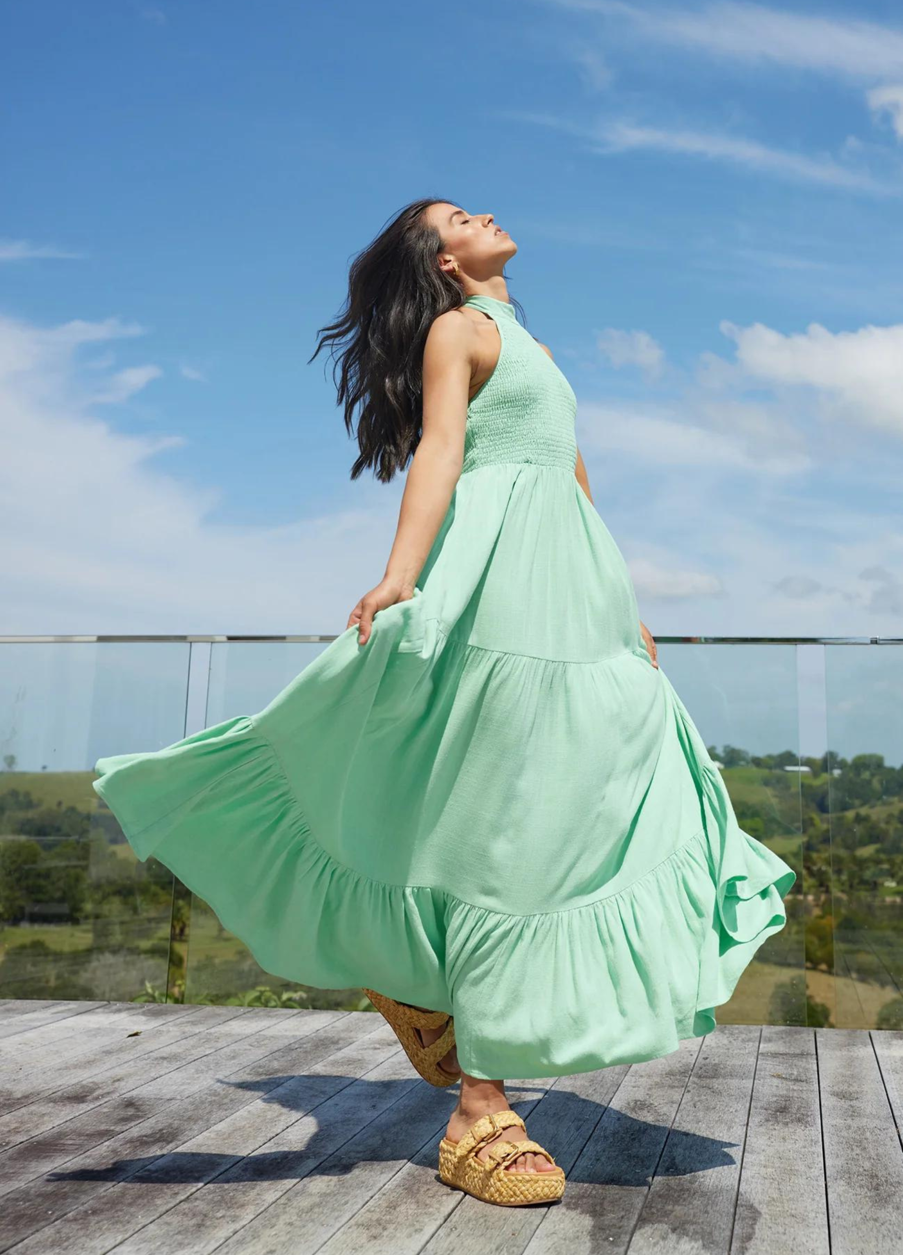 Halterneck linen blend maxi dress with tiering from girl and the sun