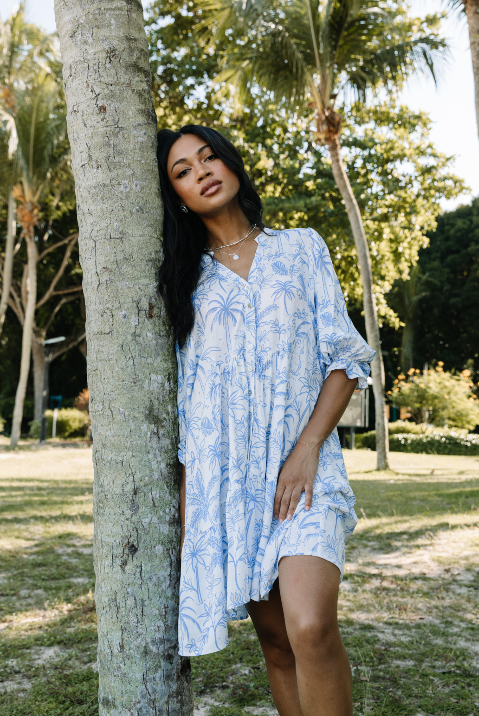 Alexis Mini Dress from ESTL in viscose fabric with palm and cockatoo print