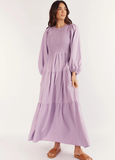 Model wearing the Journey Maxi Dress in Lilac from Girl and the Sun