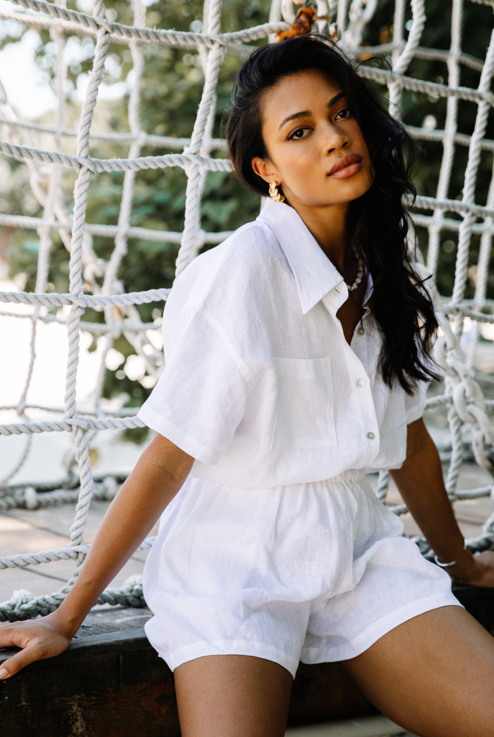 White linen shirt with shell buttons and short sleeve