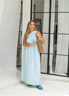 One shoulder baby blue dress in crease resistant fabric with matching belt
