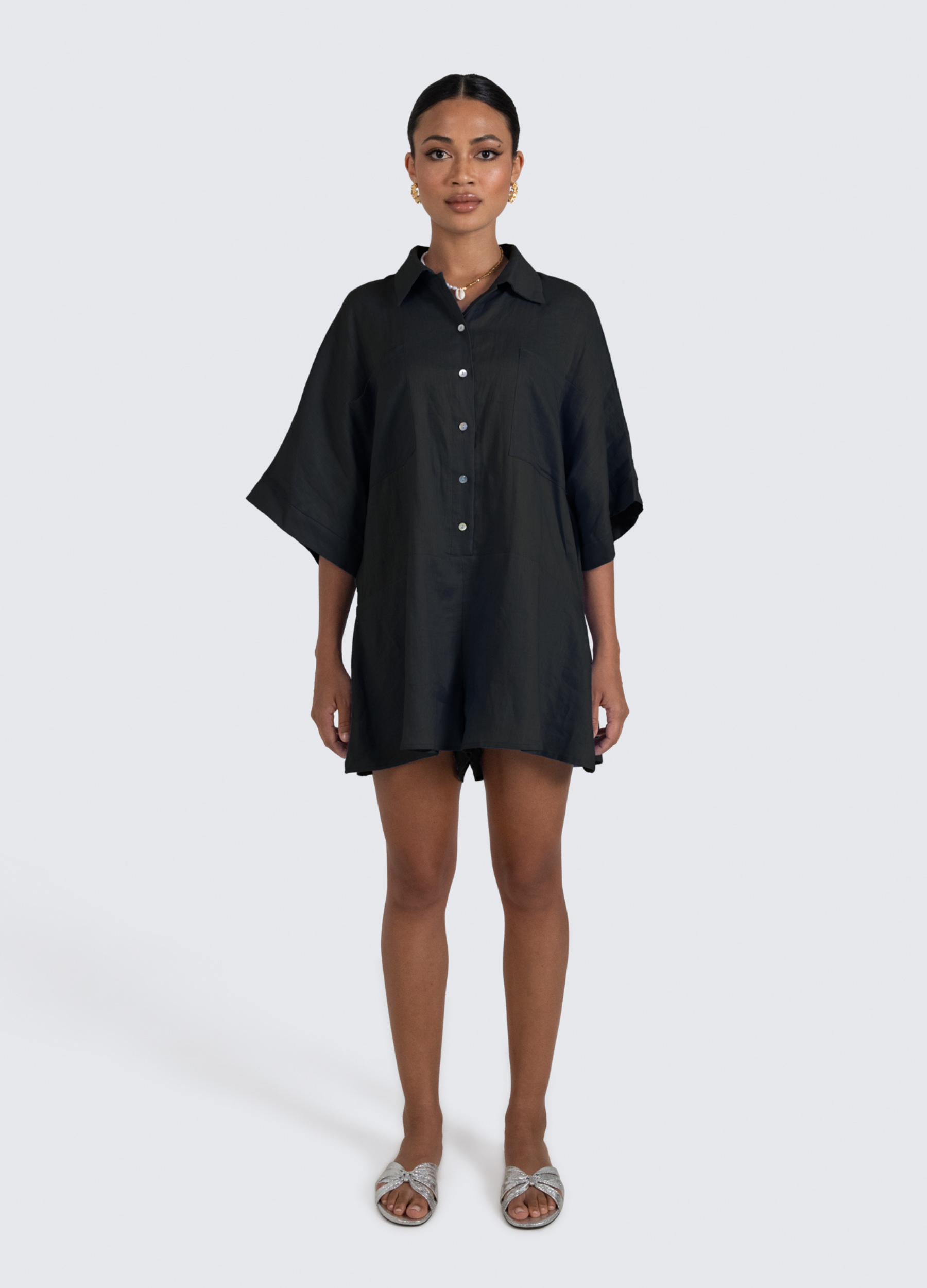 ESTL Black relaxed fit playsuit with shell buttons and a half sleeve