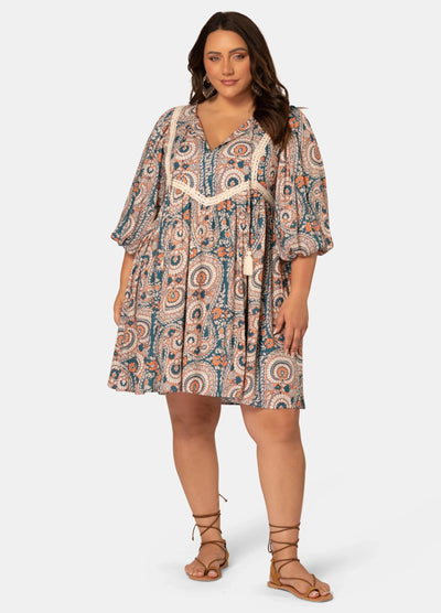 Model wearing curve boho mini dress 