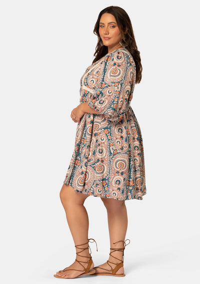 Model wearing curve boho mini dress 