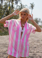 Pink and white stripe shirt dress with button front