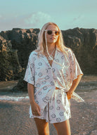 Shorts in daisy print from palm collective 