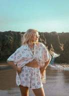 Shorts in daisy print from palm collective 