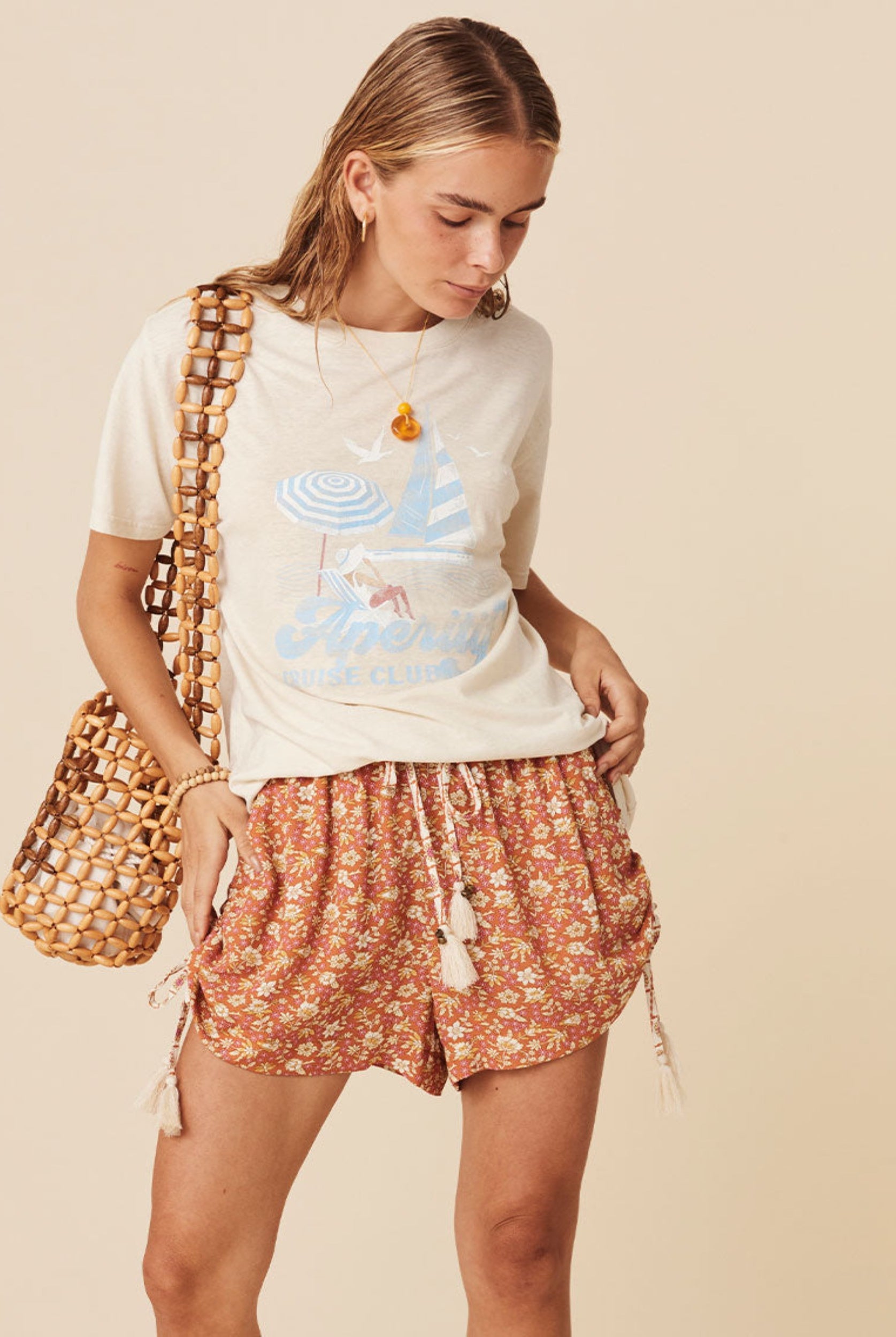 Cruise club motif tee in antique cream from Spell