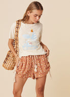 Cruise club motif tee in antique cream from Spell