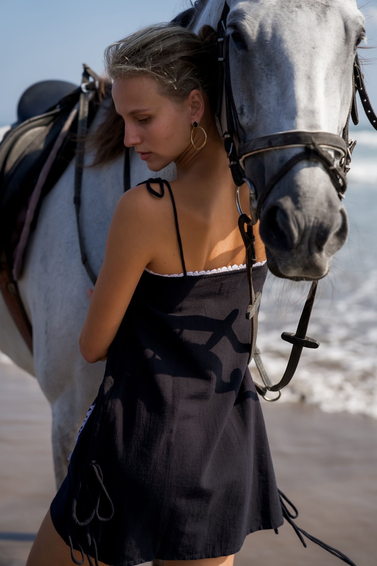 Palm Collective Paradiso Mini Dress, black mini dress with embroidered pockets
