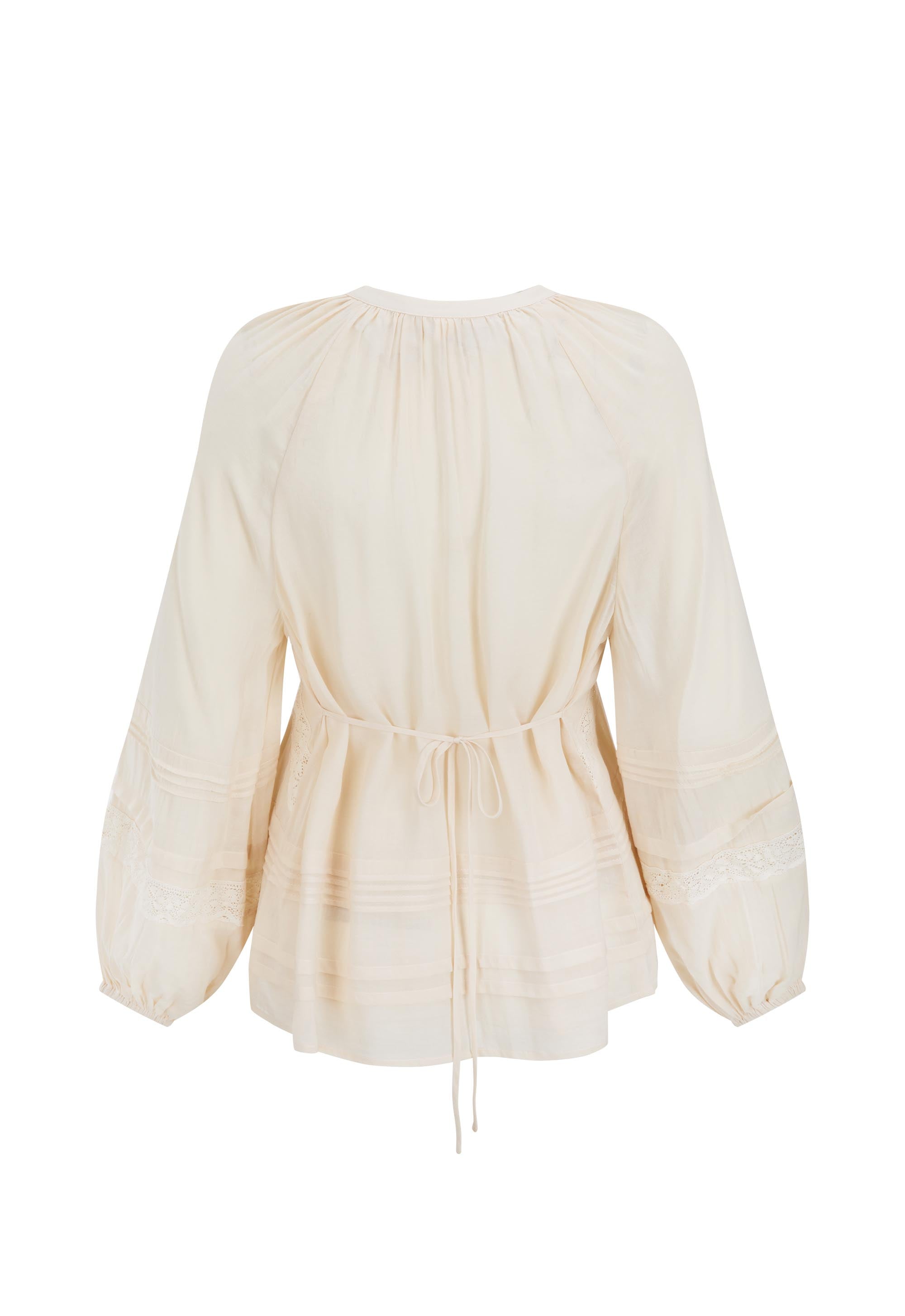 Beige blouse with long sleeves on a white background