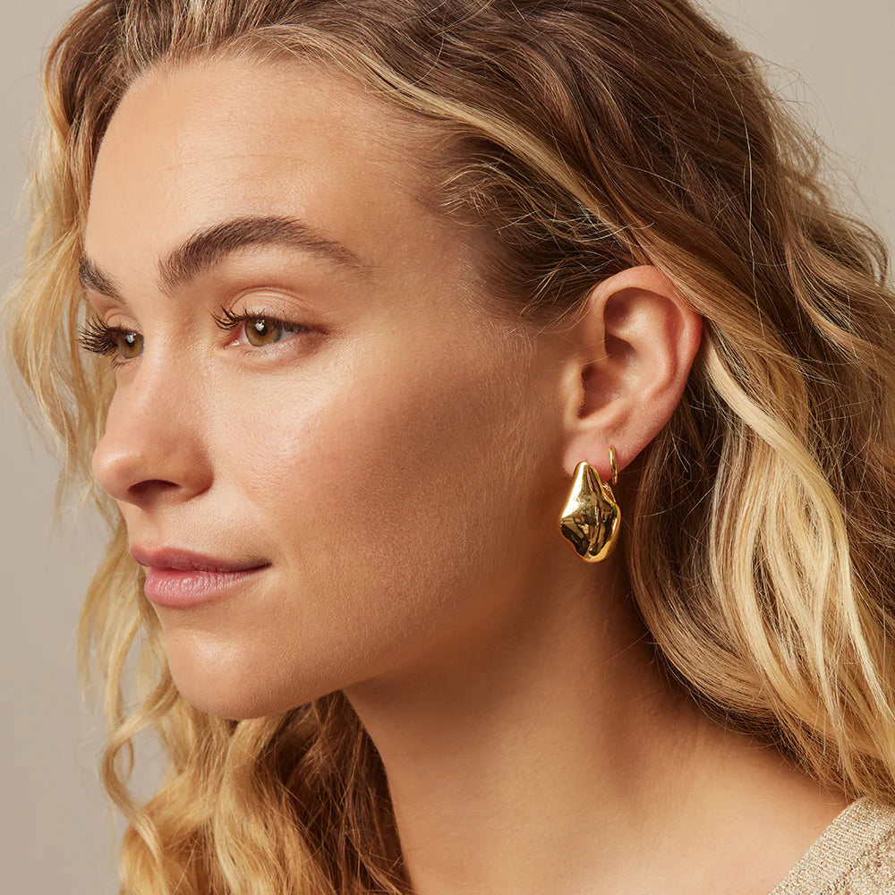 Gold statement earrings from Jolie & Deen