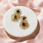 Gold statement juniper earring from Jolie & Deen