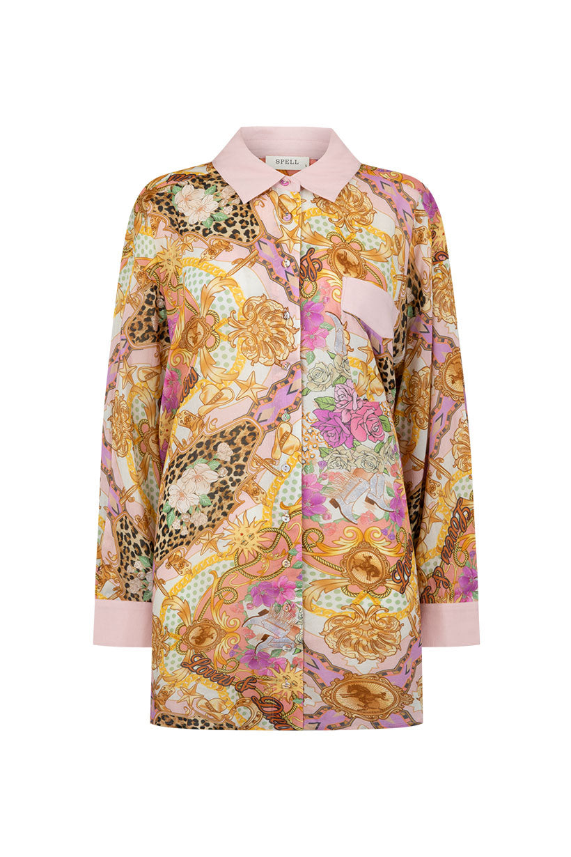 Floral patterned shirt with a white collar on a white background