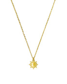 Gold necklace with a sun pendant on a white background