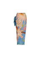Colorful floral-patterned skirt with tassels on a white background