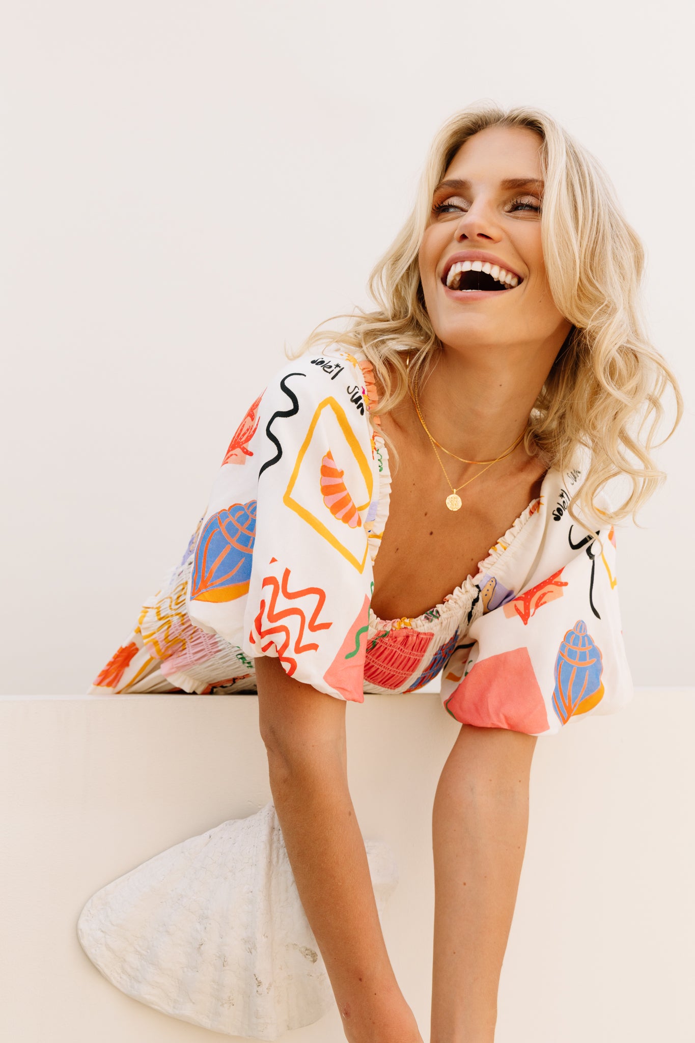 Shirred bodice midi dress in striking print inspired by Ibiza