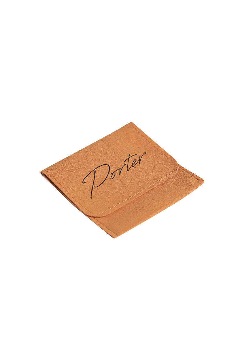 Brown leather wallet with 'Porter' branding on a white background