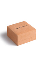 Brown jewelry box with 'Porter Jewellery' branding on a white background