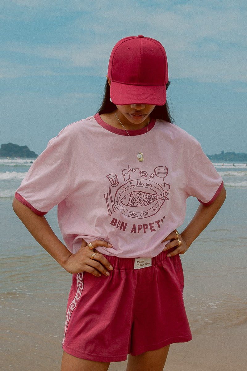 Pink shorts with contrast tape on sides