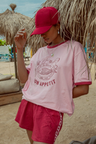Pink shorts with contrast tape on sides