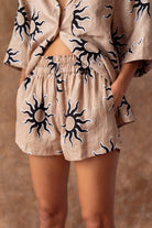 Sand shorts with black sun print in cotton linen 