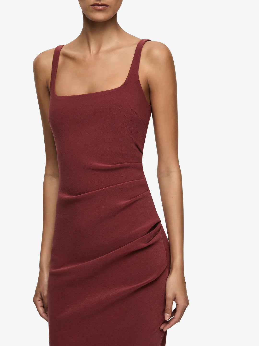 Maroon dress worn by a model on a white background