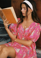Model wearing the Solstice linen mini dress from spell in rose