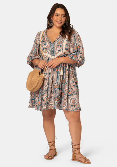 Model wearing curve boho mini dress 