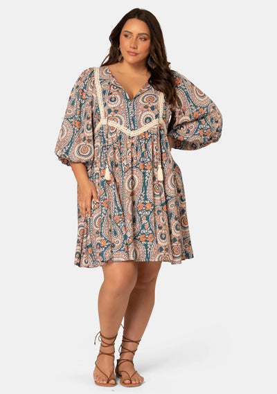 Model wearing curve boho mini dress 