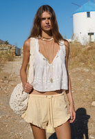 Model wearing the shell maiden cami top